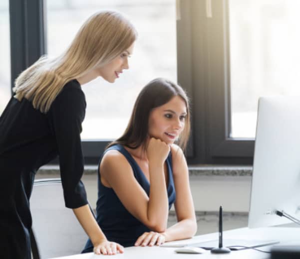 Two woman have the IT consultation in the office